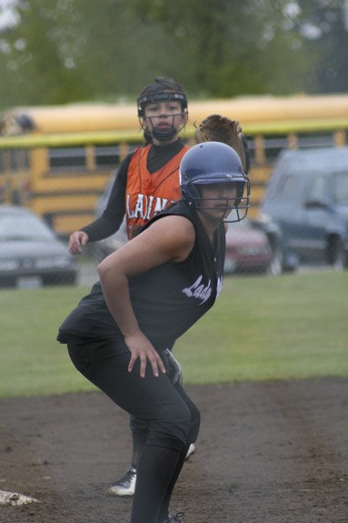 Adria Garcia prepares to run to home plate during a tournament game against Blaine.