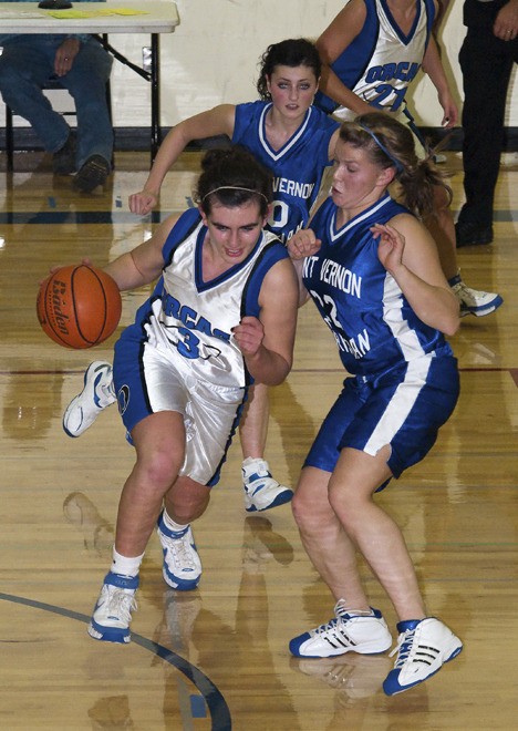 Lanie Padury (3) working her way through the Mt. Vernon Christian defense.