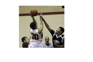 Shaun Samuel leaps for the shot.