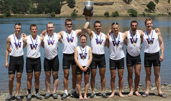 The University of Washington 1F rowing team with its trophy. Zier is pictured third from left