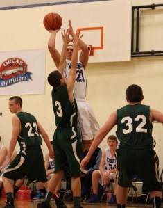 VIking Aubrey Schermerhorn jumps for a shot.