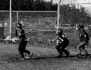 Lady Viking Jeanie Tran lays down a single base hit in Orcas’ 18-6 win over Highland Christian.