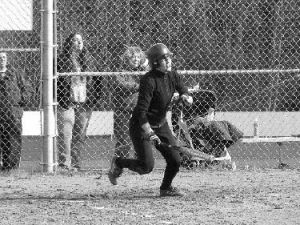 Lanie Padbury smashes an in-the-park home run.