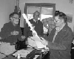 Dan Powell receives award from County Council.