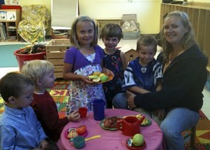 Director Amber Paulsen with some of Kaleidoscope’s kids.