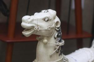 An old-fashioned rocking horse (above) and a sewing machine (top) are some of the cool items at the Granny’s Attic sale.