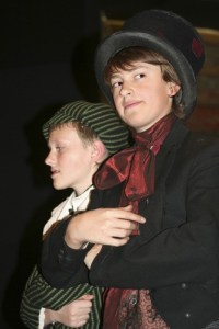 Oliver (Mason Scoggin) and the Artful Dodger (Matthew Laslo-White).
