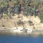 Partially submerged boat is back up