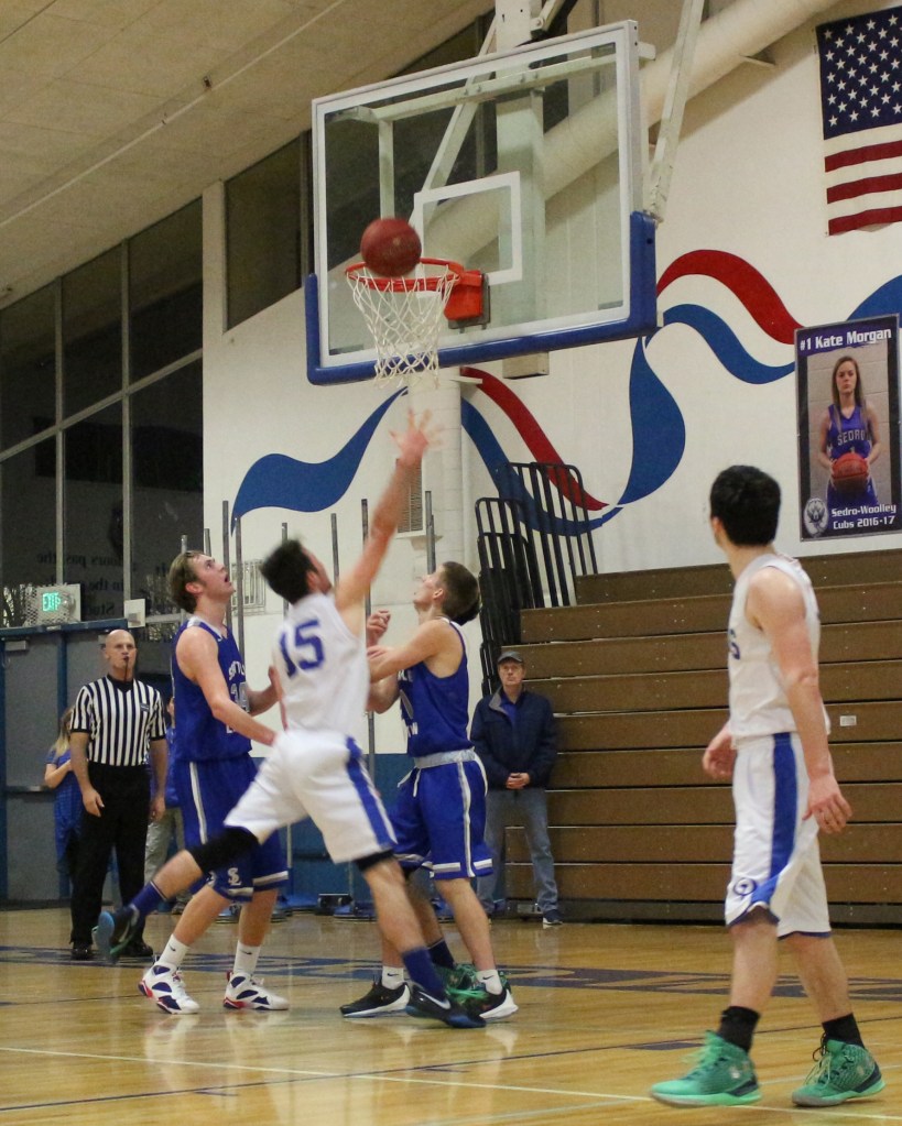 Viking boys are district champs; regional game is Feb. 25 | Photos