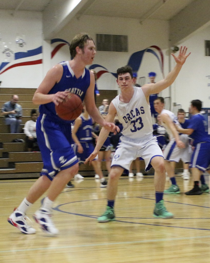 Viking boys are district champs; regional game is Feb. 25 | Photos