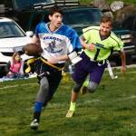 Skyler Gregg flushes the Skagit quarterback out of bounds