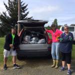 Contributed photos/Great Islands Clean-Up                                Islanders collect trash during a past Great Islands Clean-up.