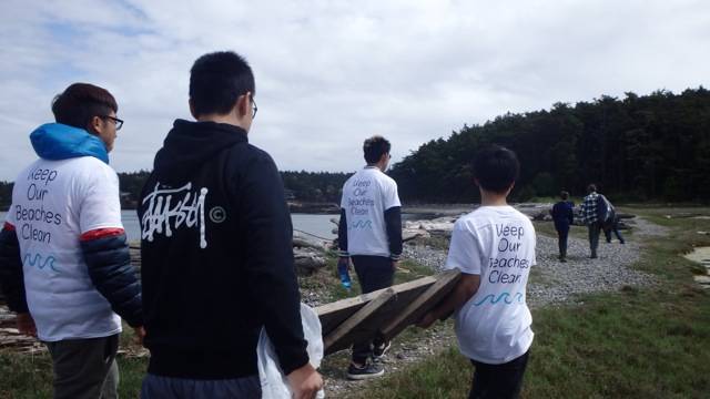 Contributed photos/Great Islands Clean-Up                                Islanders collect trash during a past Great Islands Clean-up.