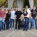 Left to right: McCabe Webb, Anah-Kate Drahn, Ashi Bartolucci, Claire Roberson, Jonathan Doherty, Maria Schwartz, Michael Chesher, and Hayden Simpson in front of the Children&rsquo;s Peace Monument, Hiroshima.