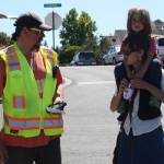 Staff photo/Hayley Day                                Washington State Ferry employee Robert Kyte answers questions about delays at the Friday Harbor terminal on Tuesday, July 18.