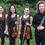 From left to right: Lisa Carter, Paris Wilson, Emy Carter and Tate Cohan before Martin Lund&rsquo;s One World concert at Orcas Center.