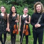 From left to right: Lisa Carter, Paris Wilson, Emy Carter and Tate Cohan before Martin Lund&rsquo;s One World concert at Orcas Center.