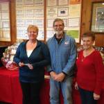 Contributed photo                                American Legion Auxiliary Treasurer Connie Haugen (left) and First Vice President Jan Cleveland (right) presenting a check to Jack Becker in the amount of $800 for the Mercy Flight fuel fund on Orcas.