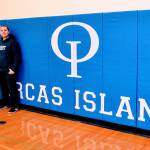 Island Market donates new wall mats to high school
