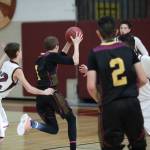 Saints boys basketball ends on a united front