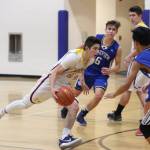 Saints boys basketball ends on a united front