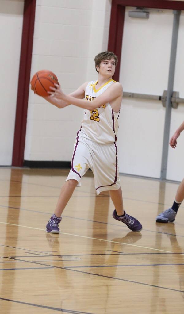 Saints boys basketball ends on a united front