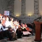 Taylor McAvoy photo                                Anna Justen, a junior at Ingraham High School in Seattle, leads a chant. No more silence, the crowd chanted. End gun violence.