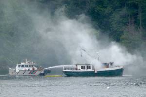 Multi-agency response to Judd Cove boat fire