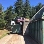 SUV dangles dangerously at Lopez Dump