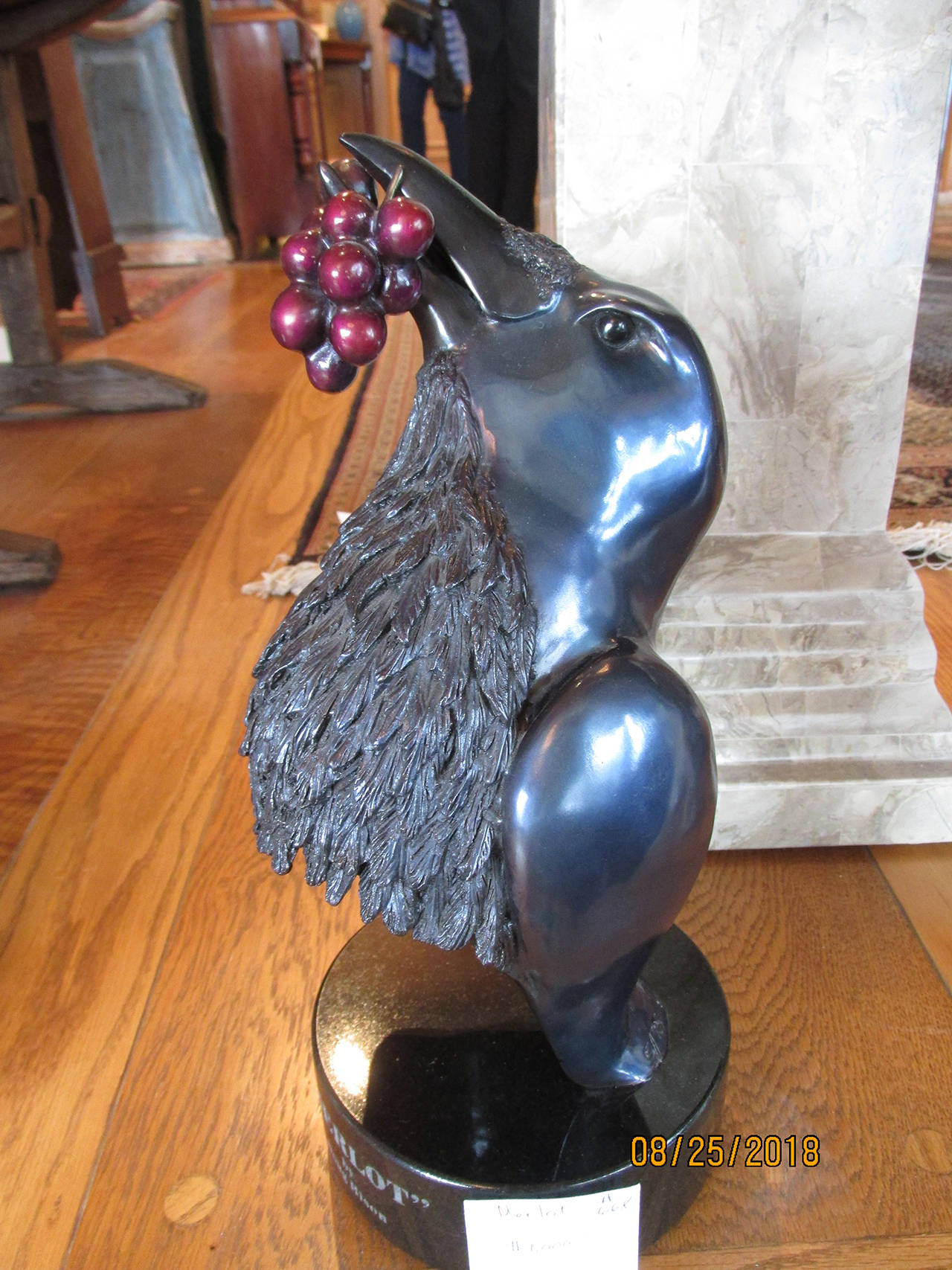 Islanders peruse and purchase pieces of local collection