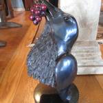 Islanders peruse and purchase pieces of local collection