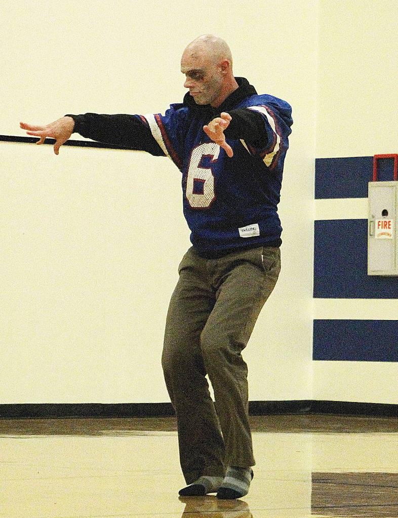 Homecoming assembly and parade photos | Soccer game and barbecue on Saturday