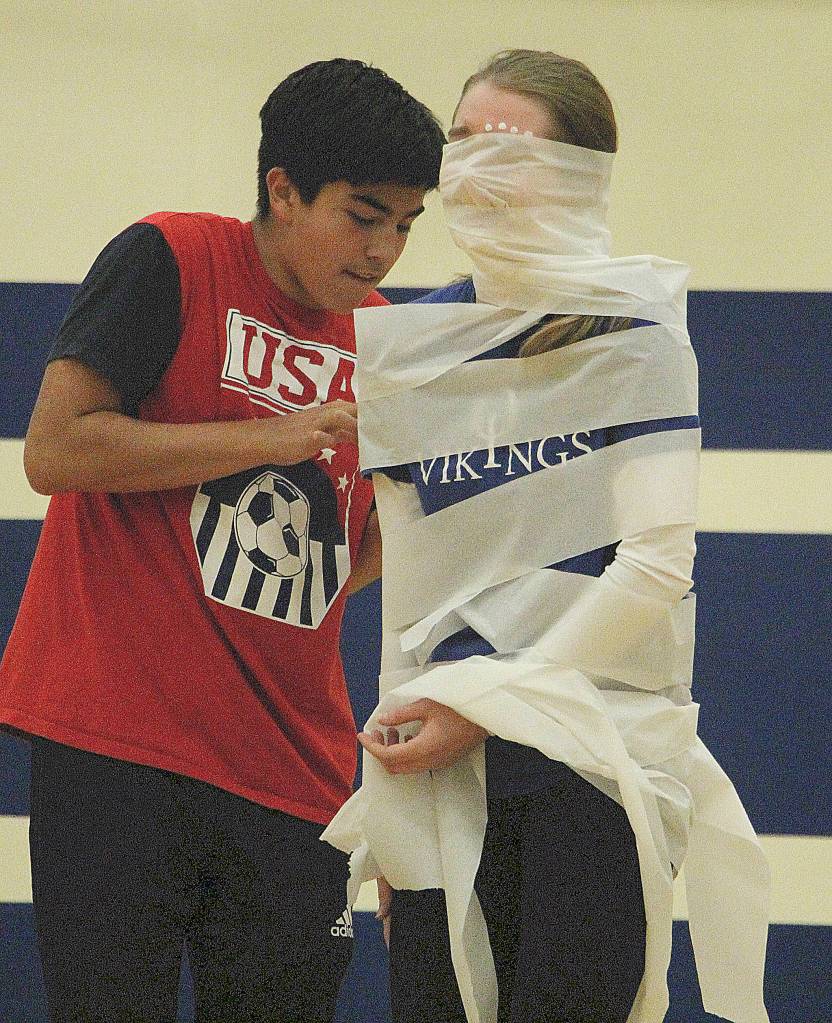 Homecoming assembly and parade photos | Soccer game and barbecue on Saturday