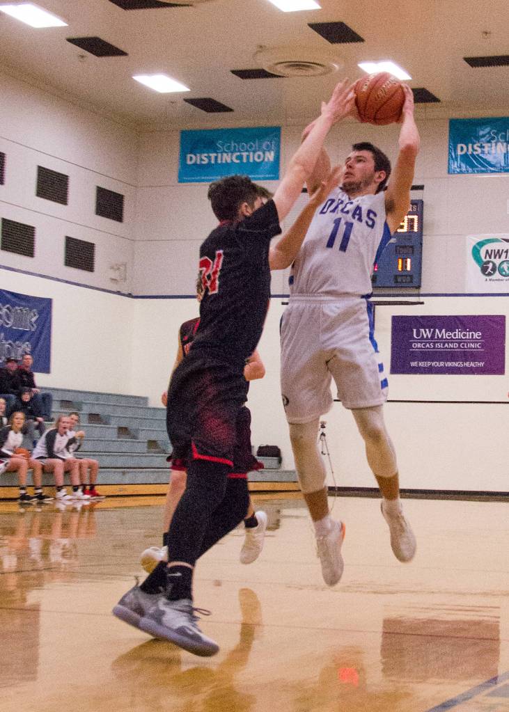 Viking basketball players working hard