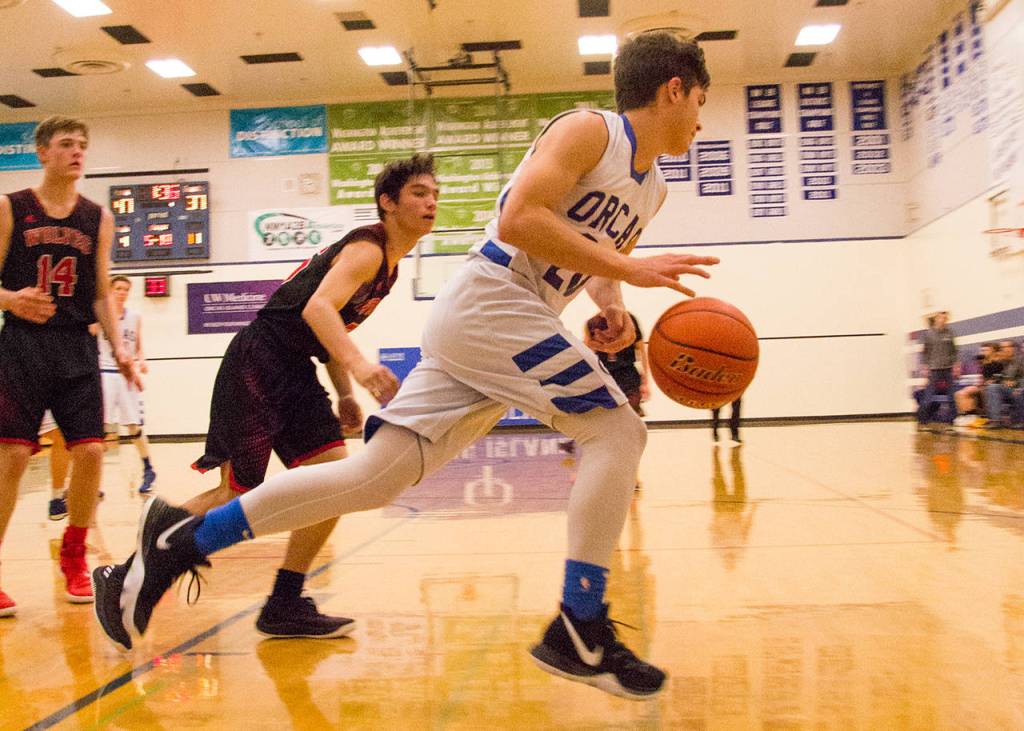 Viking basketball players working hard