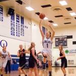 Viking basketball players working hard