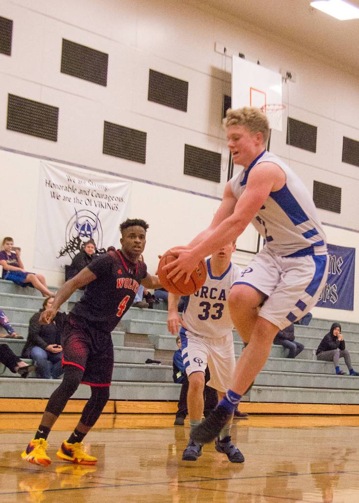 Viking basketball players working hard