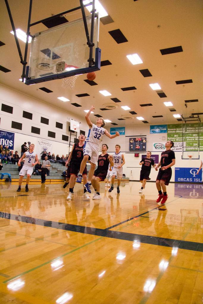 Viking basketball players working hard