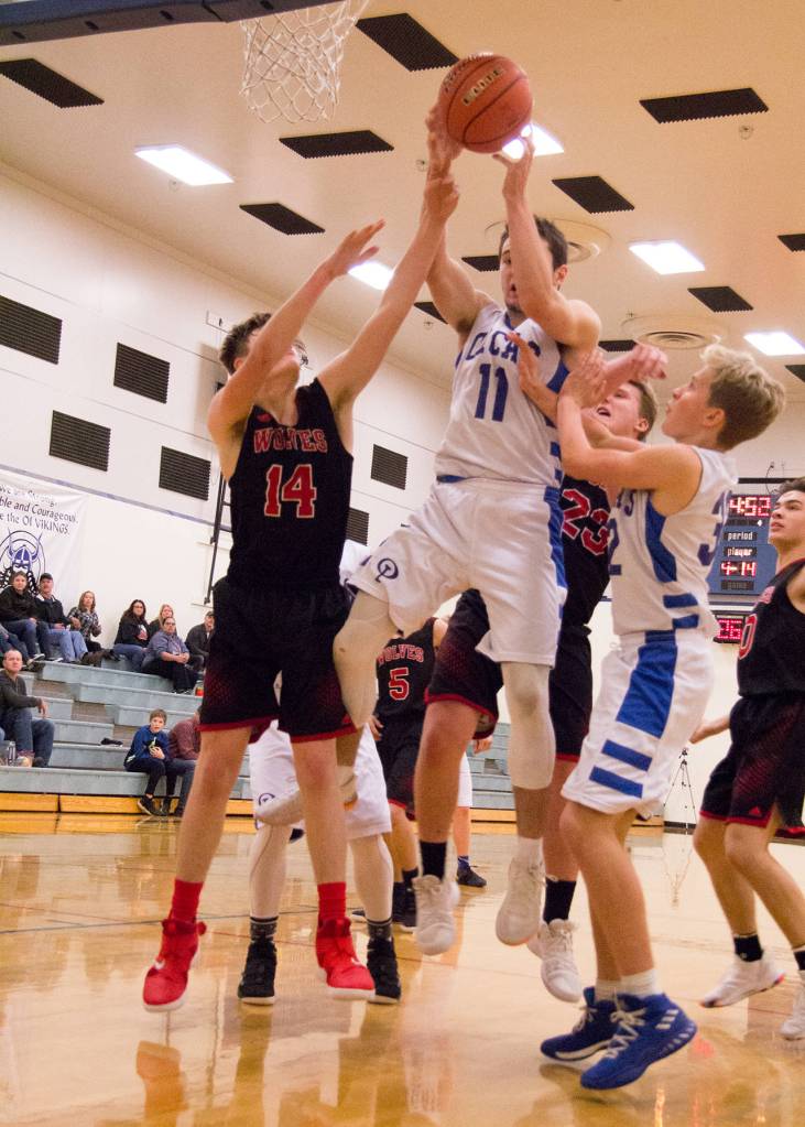 Viking basketball players working hard