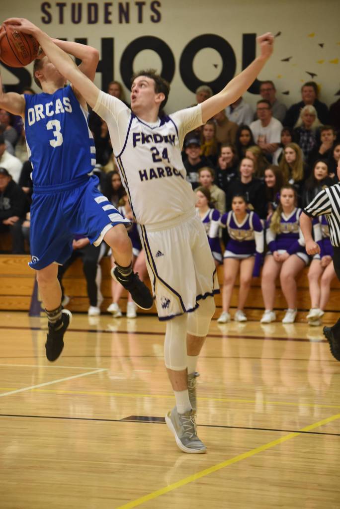 Staff photo/Tate Thomson                                Kyle Mapstead blocks a shot.