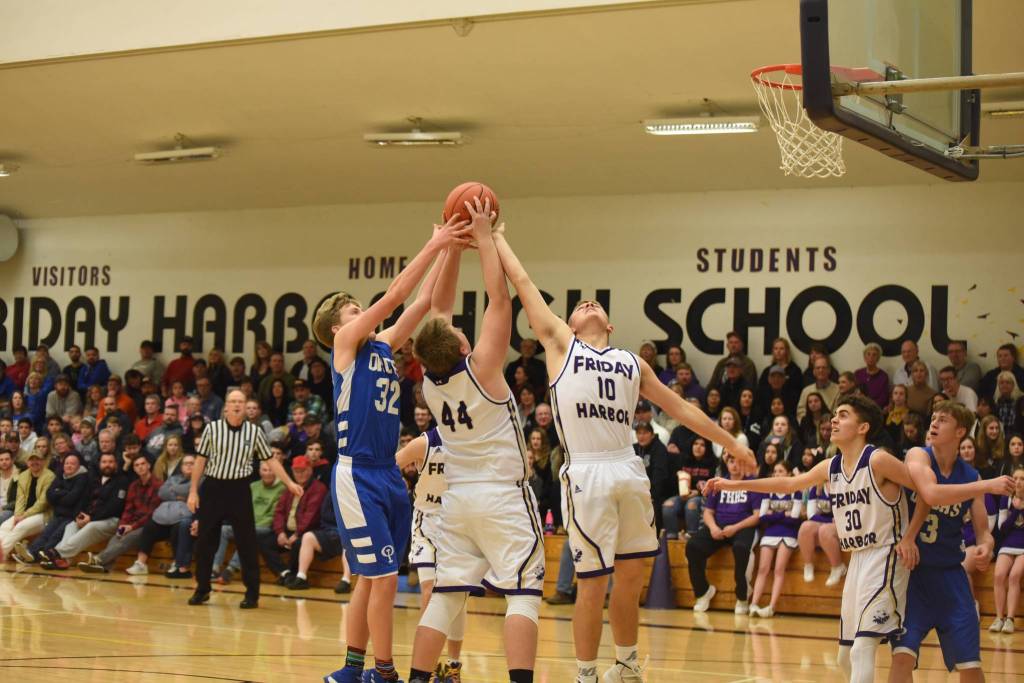 Staff photo/Tate Thomson                                Wolverines battle a Viking for the ball.