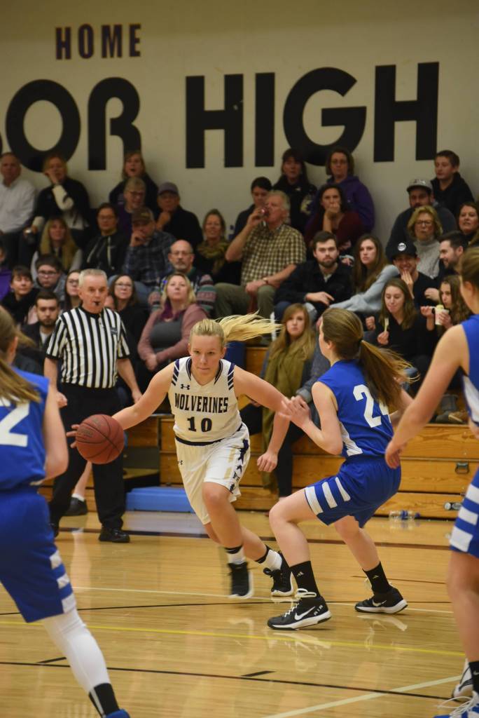 Boys, girls Wolverines basketball defeat Vikings on home turf