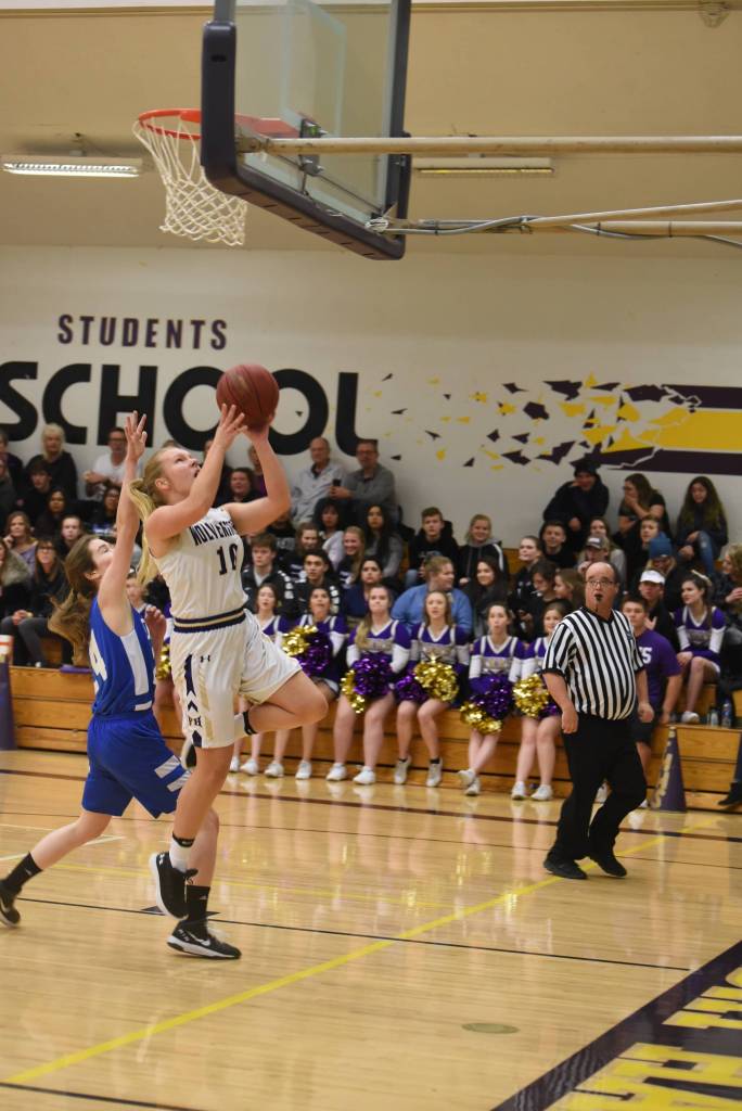 Boys, girls Wolverines basketball defeat Vikings on home turf