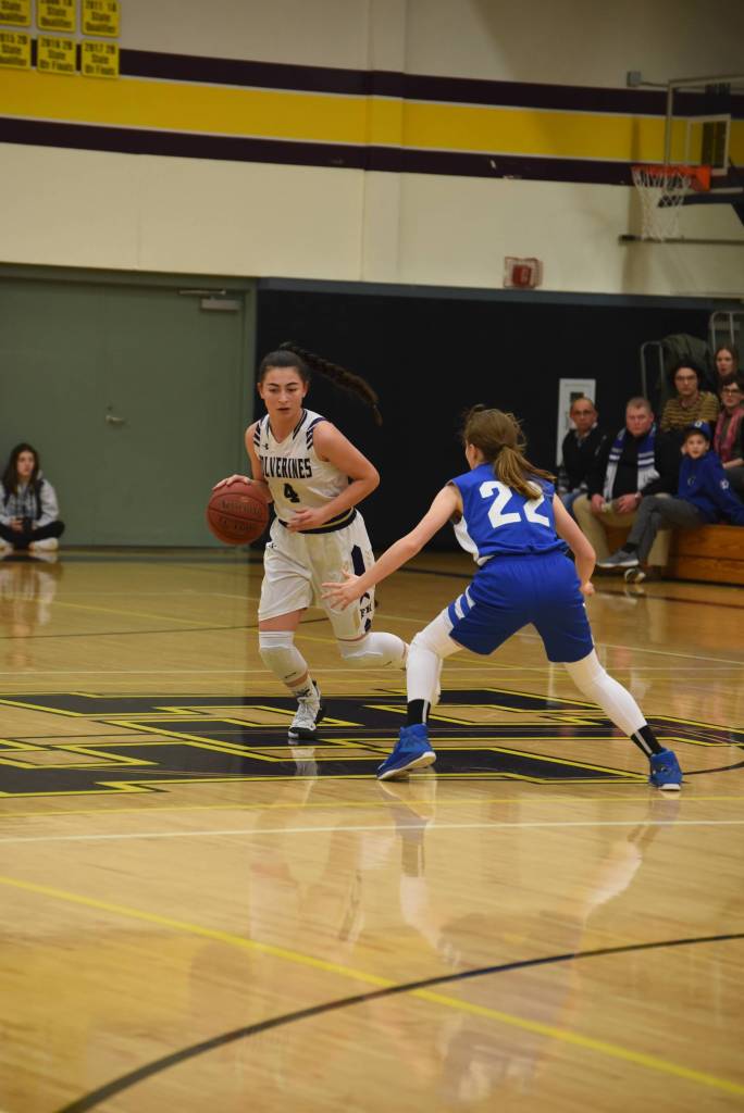Boys, girls Wolverines basketball defeat Vikings on home turf