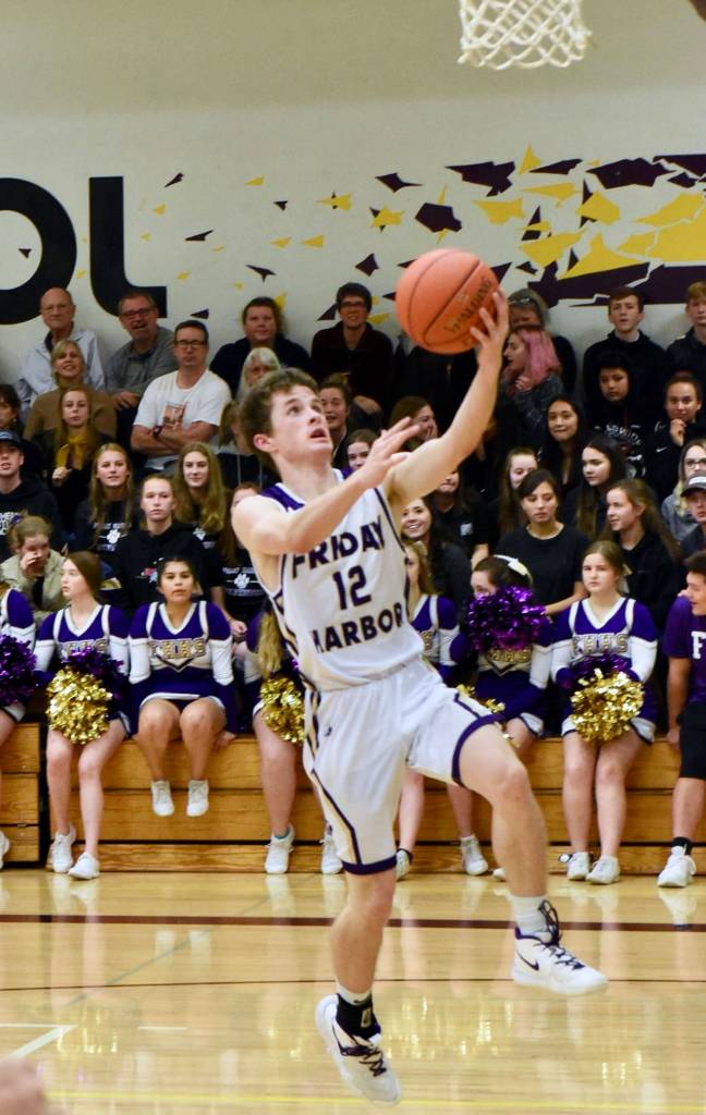 Boys, girls Wolverines basketball defeat Vikings on home turf