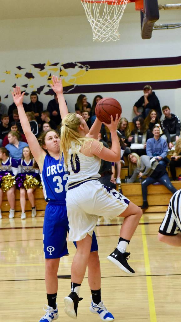 Contributed photo/John Stimpson                                Tori Polda continues the scoring drive with 2 more points.