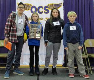 Diane Craig/staff photo                                At left: Nicholas Rivera, Hazel McKenzie, Milana Schneider and Elijah Griffith at the spelling bee.
