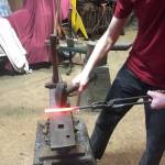 <strong>Contributed photo</strong>                                <em>Above: Thian Armenia learning metalwork.</em>