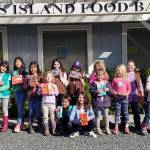Girl Scouts donate cookies to Orcas Food Bank