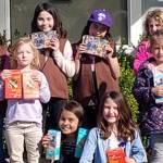 Girl Scouts donate cookies to Orcas Food Bank